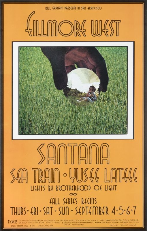 No. 190, image of hand holding a glass ball with image of child, grass, Seatrain, Yusef Lateff; green, orange