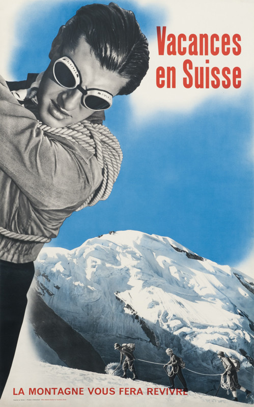 Mountain climbers on mountain; blue, red, white