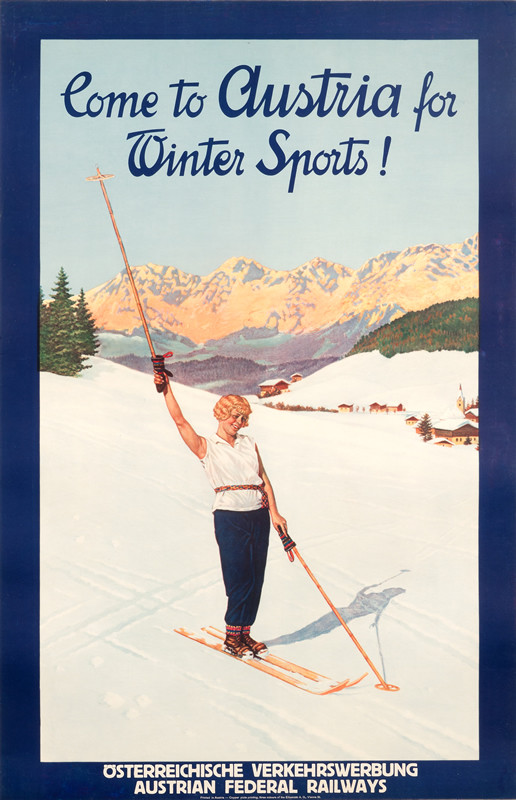 Woman skiier raises a ski pole; white, blue, green