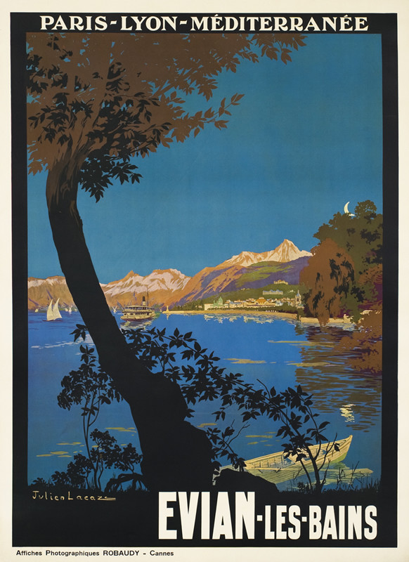 Evening scene of lake, with a tree in foreground, mountains and town in distance; blue, brown