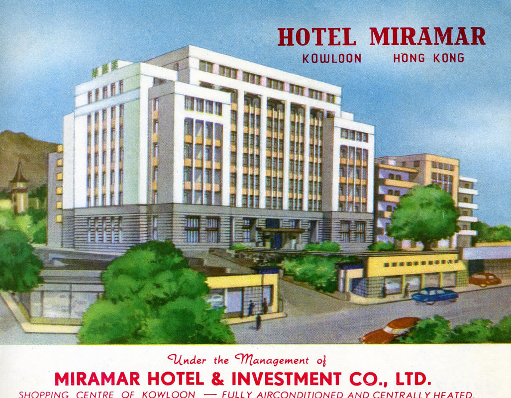hotel with sky and mountains in background; blue, green