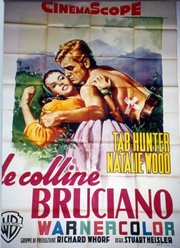 Couple embracing in front of hills (Tab Hunter, Natalie Wood)