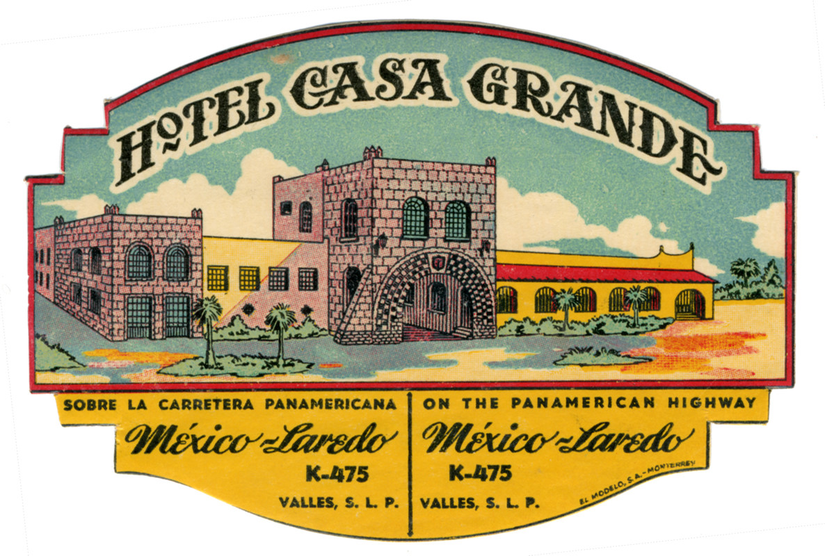 View of hotel over text; blue, red, yellow