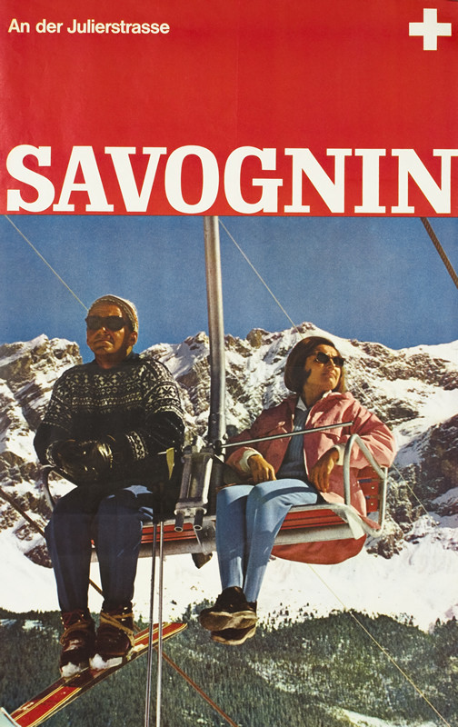 Couple in chairlift against mountain backdrop; red, blue