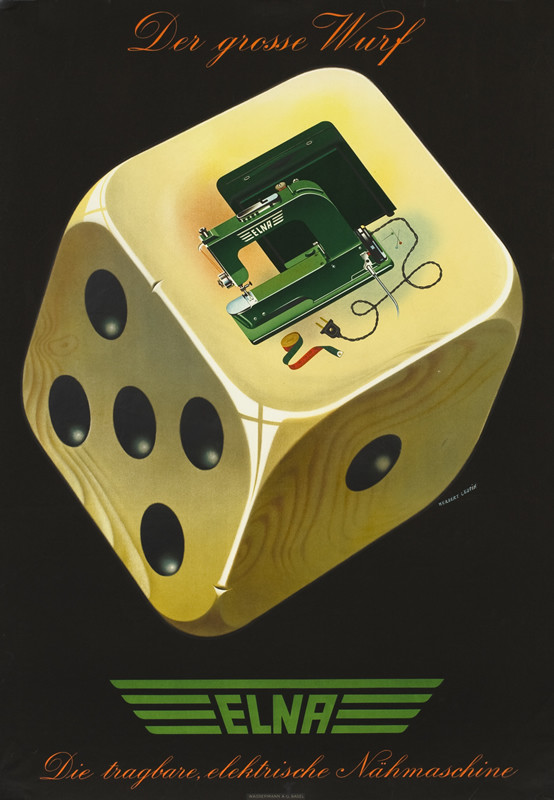 A die with one of the sides depicting a sewing machine and its case; black, green, white