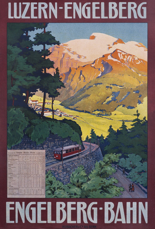 Bus goes through highway in mountains passing a village; blue, red, green
