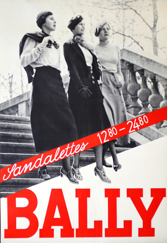 Three ladies stroll down stairs; black and white