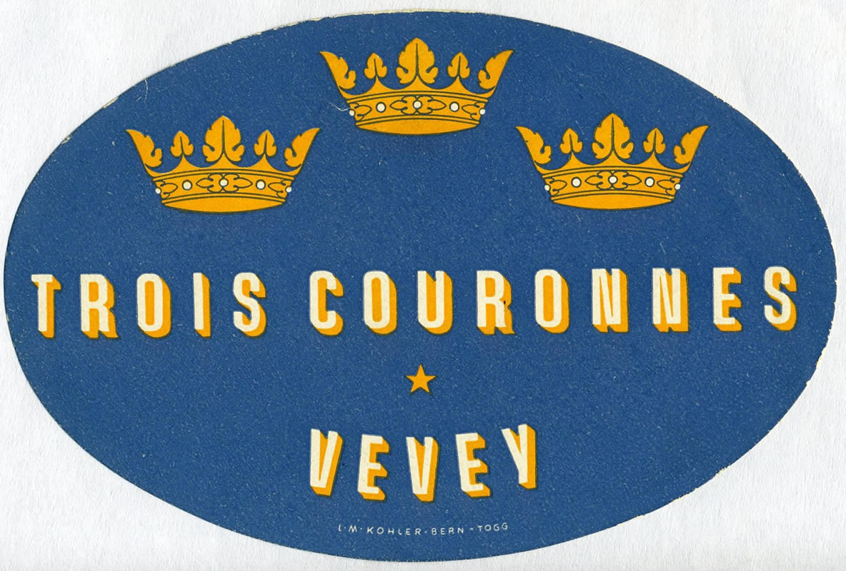 Three crowns; white, yellow, blue