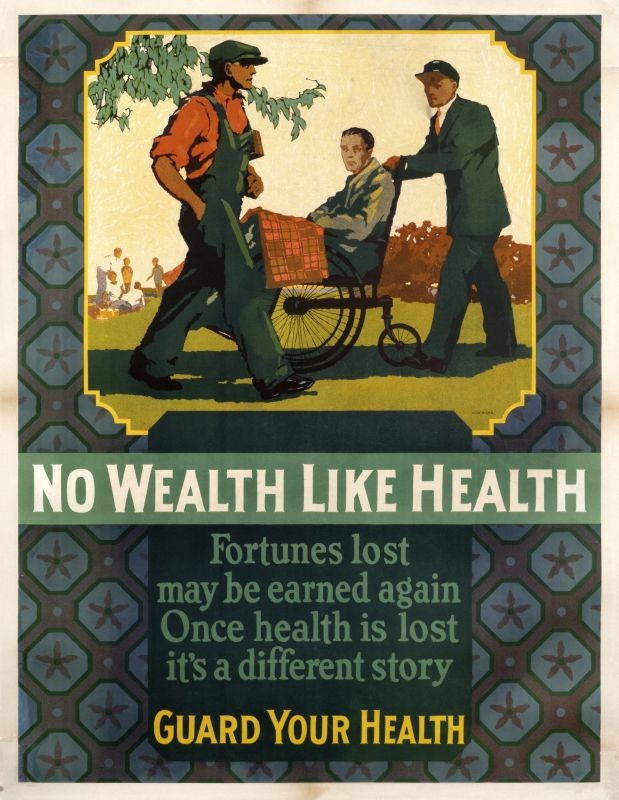 Robust worker strides past man in wheelchair with assistant; purple, green