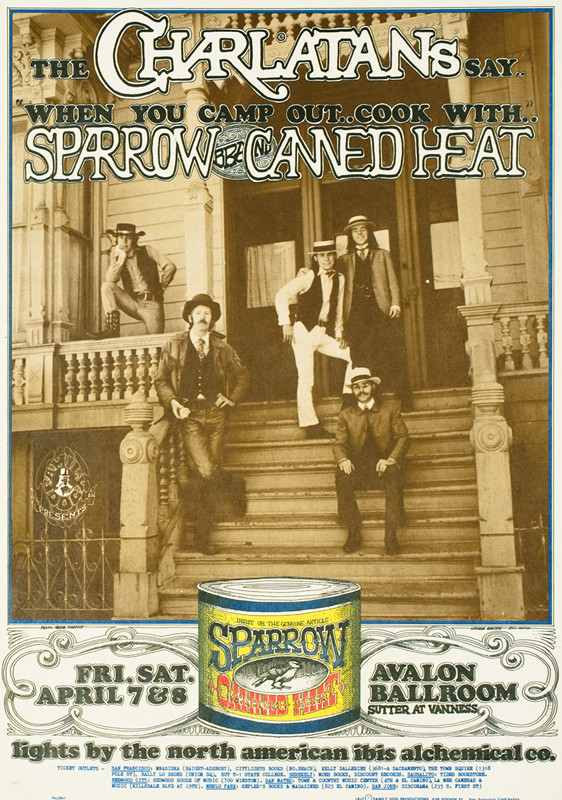 Photograph of band members sitting on steps of building, can below; brown, white, yellow, blue