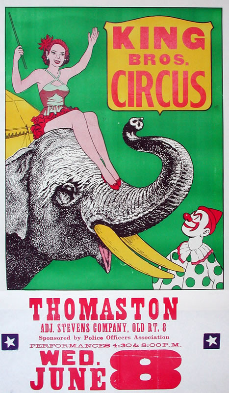 Woman seated on elephant as clown looks on; green, red, yellow