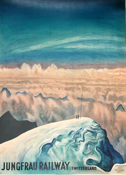 View of mountains and clouds with men at mountain peak; blue, white