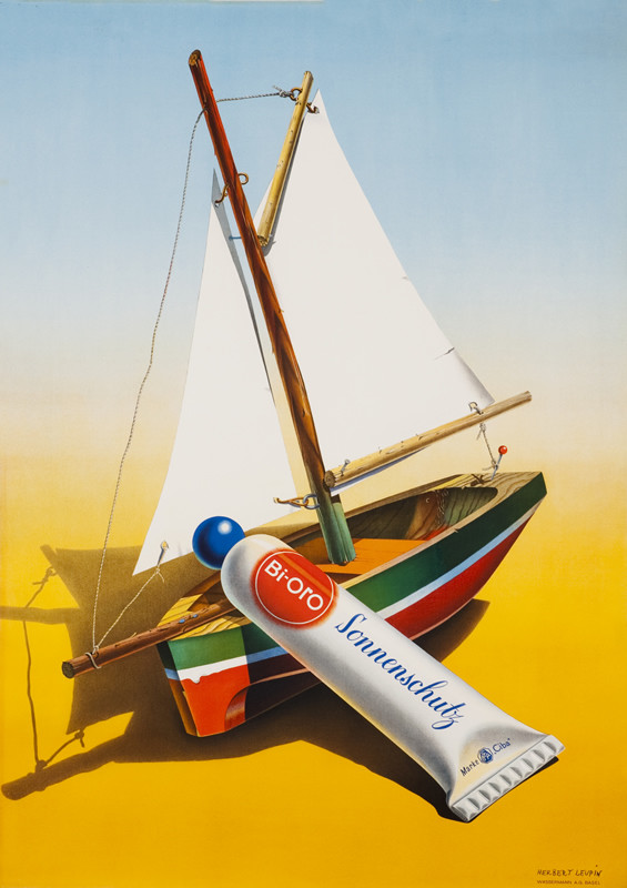 Sailboat with suntan tube; blue, yellow, red, green