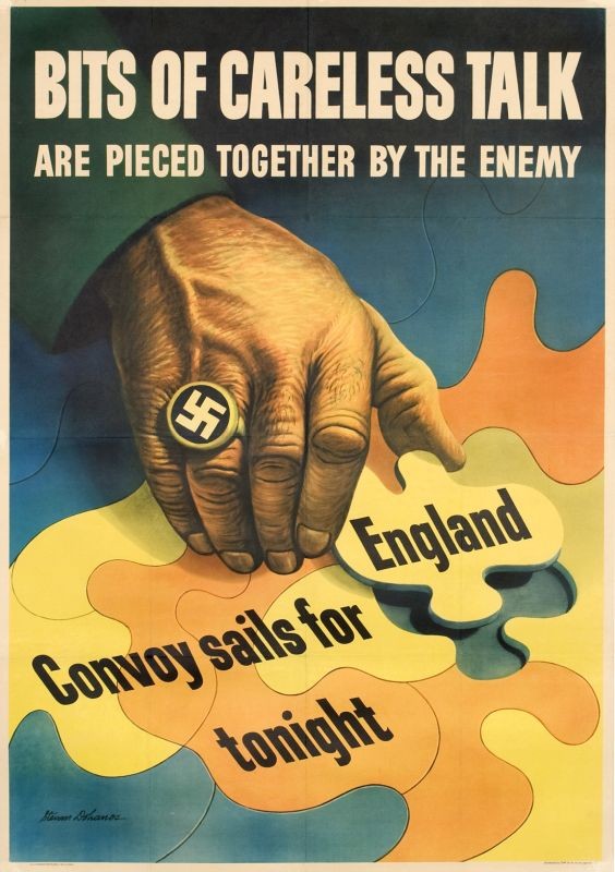 Hairy hand with Nazi swastika ring plays with puzzle pieces of map of Europe; blue, yellow, orange, green