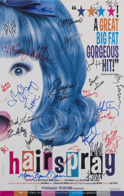 Face of hairspray star with mouth open; blue, white, pink
