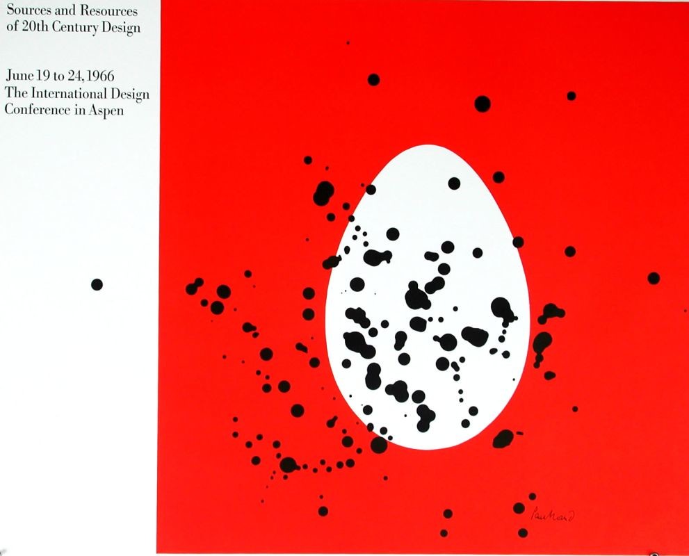 White egg with black ink stains on red; black, red, white