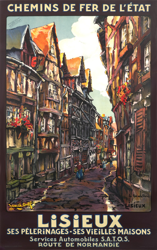 View of the famous Rue aux Fevres, a cobblestone street with medieval buildings; red, brown