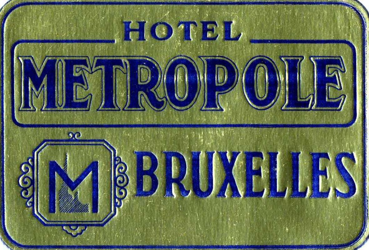 "M" in emblem, text; gold, blue
