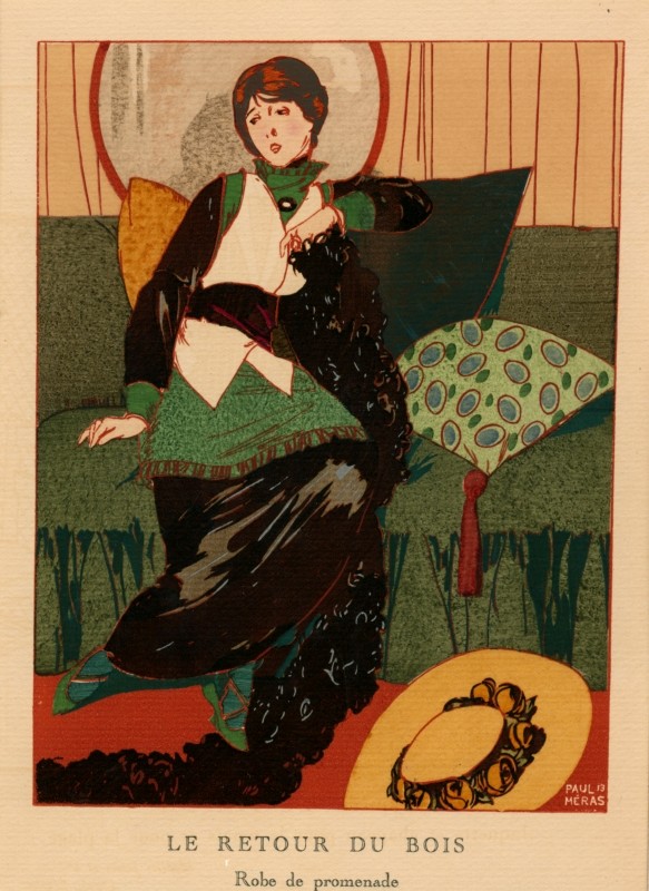 woman sitting back on a couch, holding boa; gray, green, red