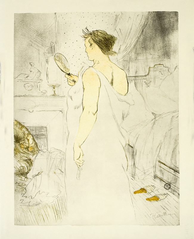 Standing woman looks in mirror; tan, white, black