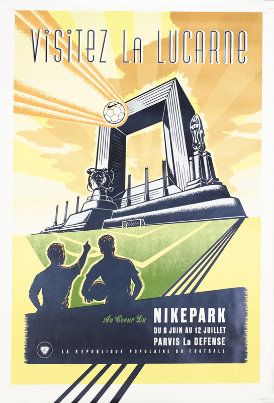 Arche de la Défense behind soccer field and ball acting as goal posts, boys pointing and looking; yellow, green, gray