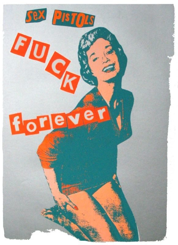 Girl in tight sweater kneels; teal, silver, beige, orange